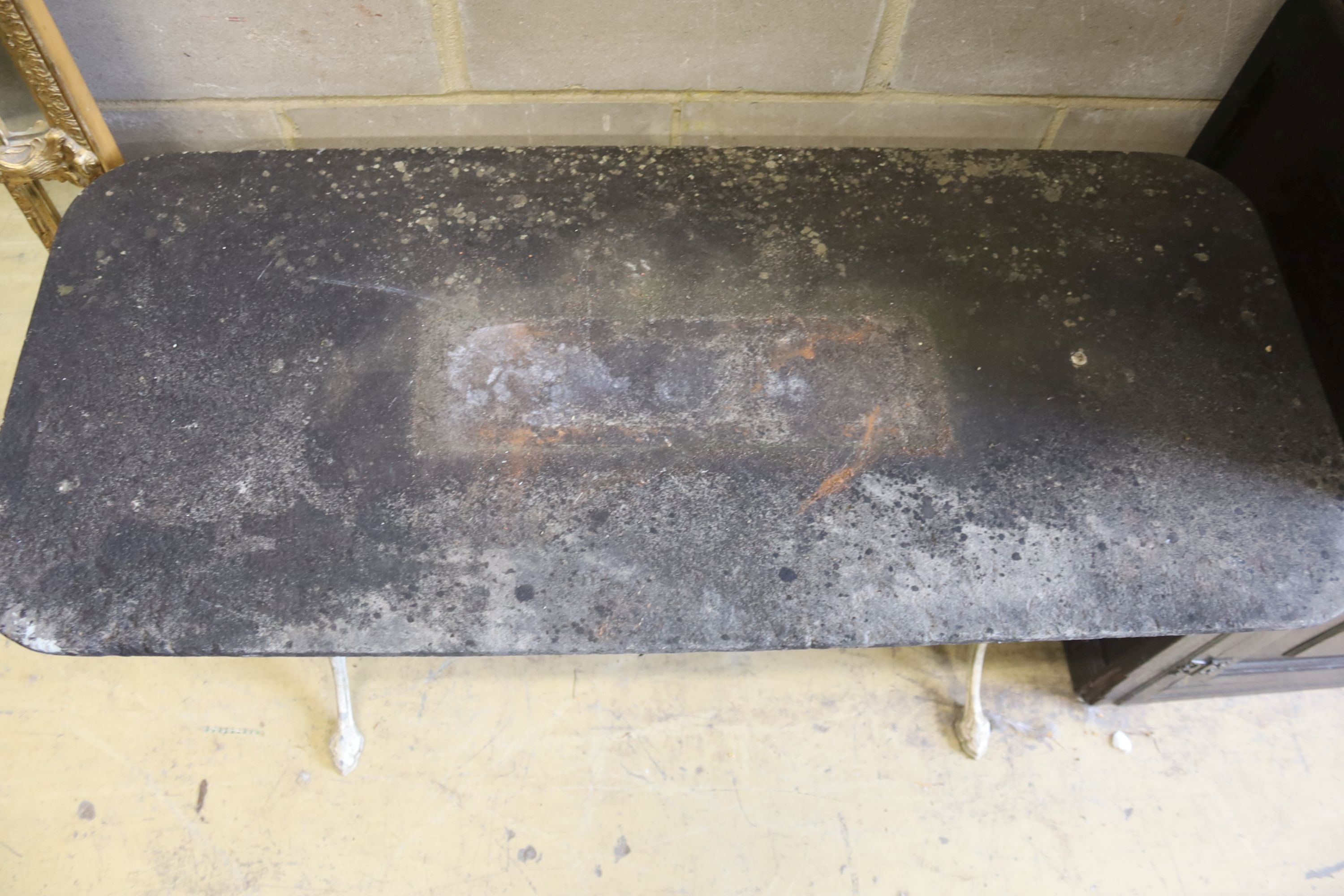 A Victorian marble topped cast iron rectangular garden table, length 122cm, depth 52cm, height 73cm